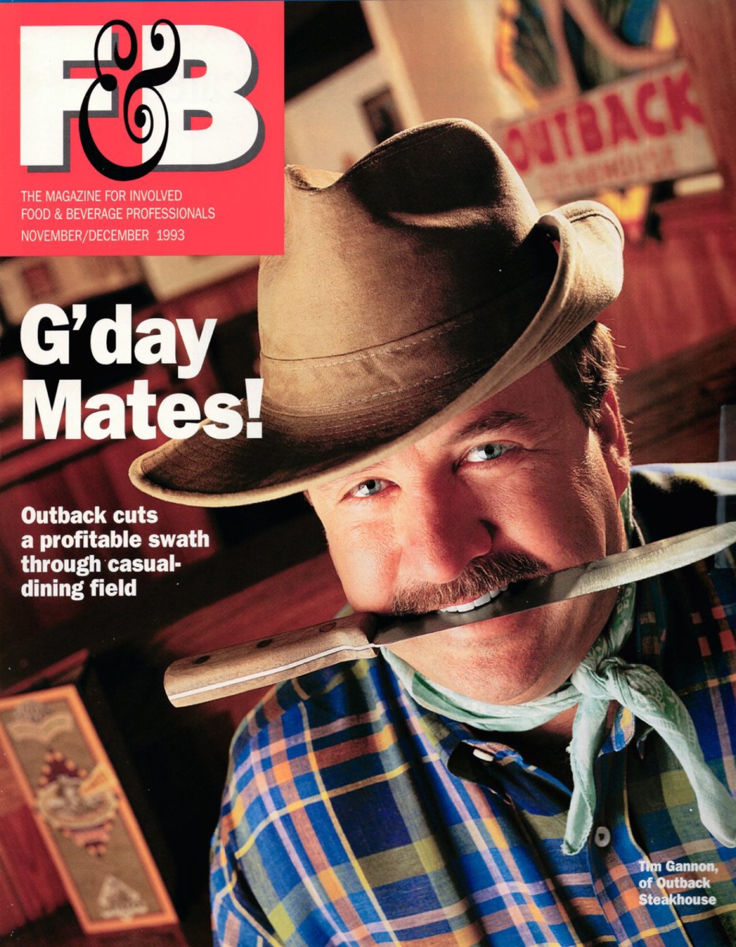 Magazine cover featuring a smiling man wearing a cowboy hat and a plaid shirt, with a knife held in his mouth. The cover has the title 'F&B' and the subtitle 'G'day Mates!' referring to Outback Steakhouse.