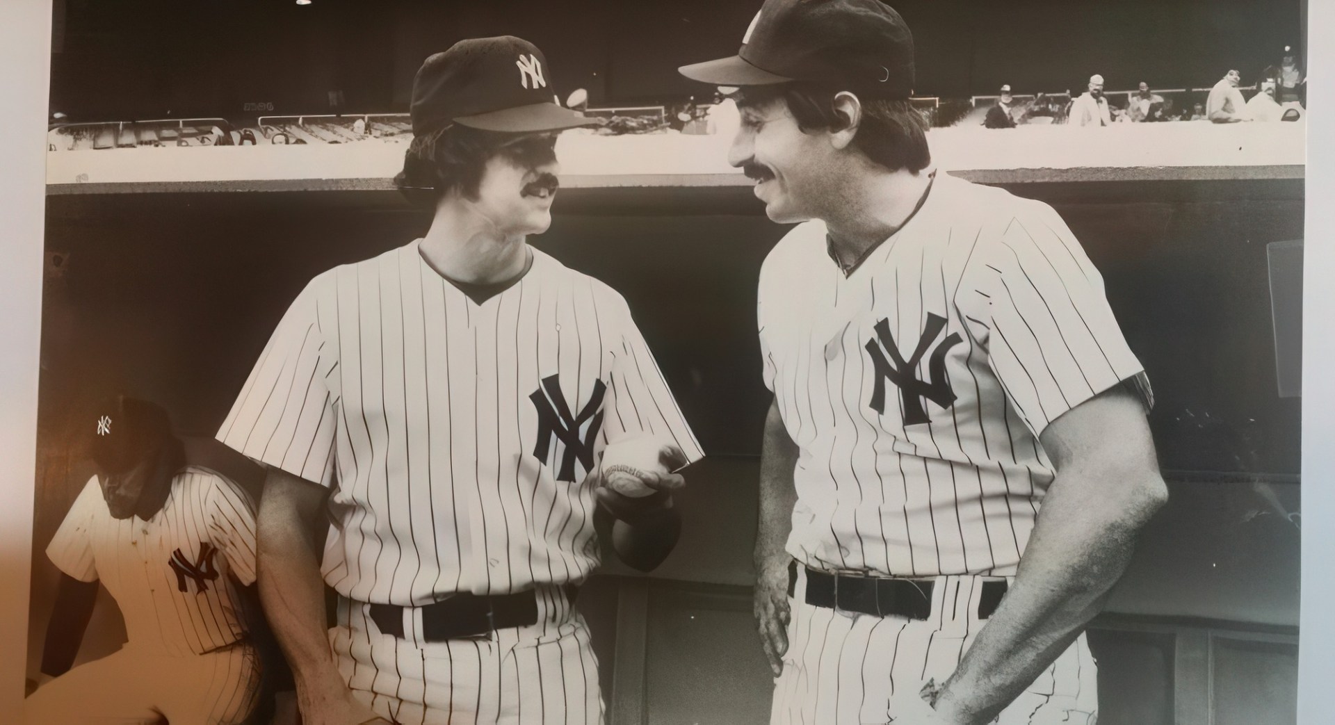 Dom Scala with Yankees pitcher Ron Guidry in the dugout
