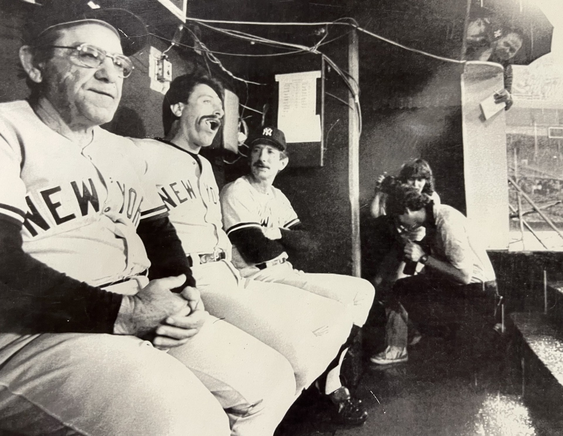 Yogi Berra, Dom Scala and Billy Martin in the visitors’ dugout during a rain delay at Baltimore